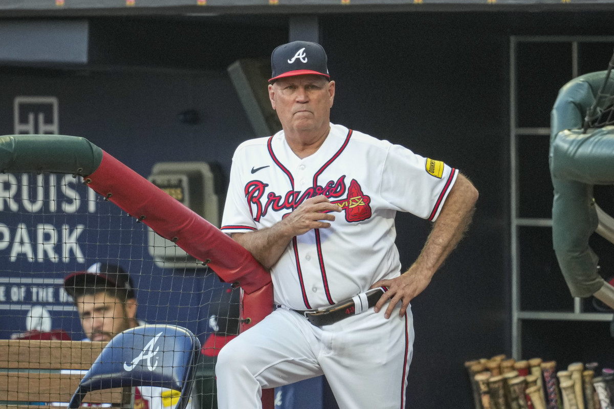 Aug 23, 2023; Cumberland, Georgia, USA; Atlanta Braves manager Brian Snitker (43) shown in the dugout against the New York Mets during the first inning at Truist Park. Mandatory Credit: Dale Zanine-USA TODAY Sports  